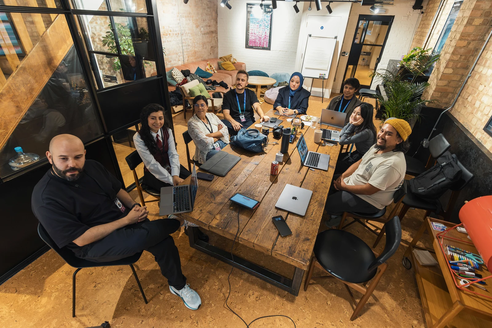 A diverse professional team collaborating around a shared table